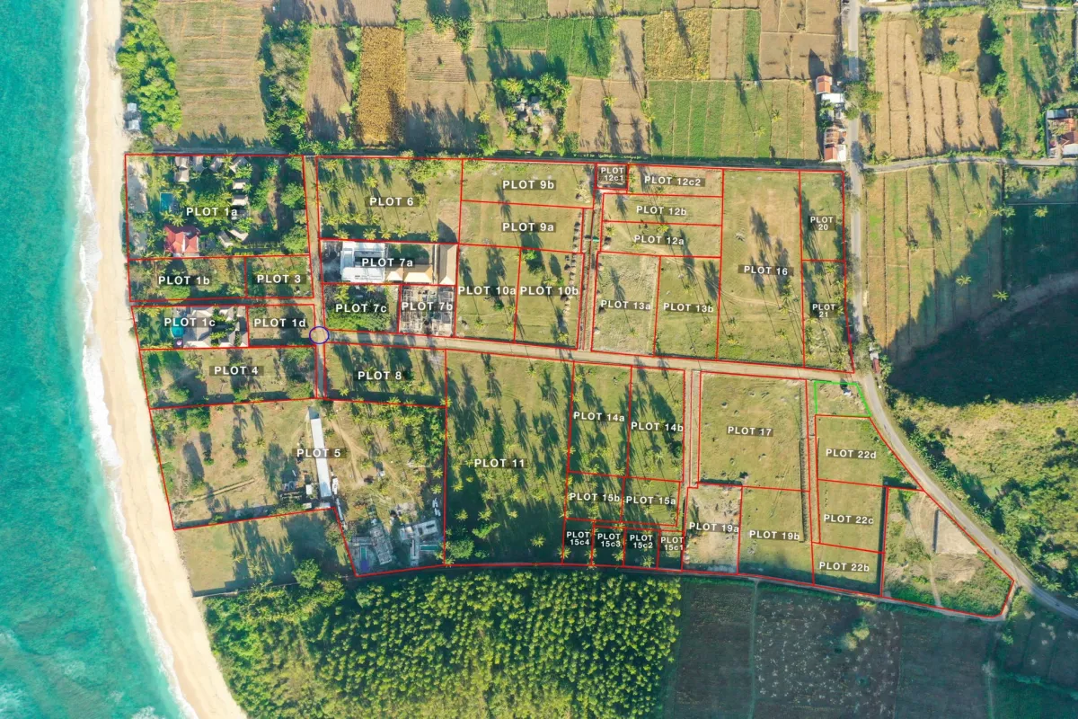 Aerial view of the Twin Peaks Serangan beachfront plots on Selong Belanak Bay, South Lombok